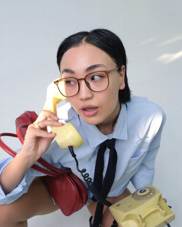 A zine-style collage of a woman on the phone